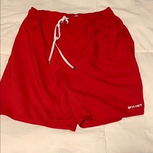 Red swim shorts